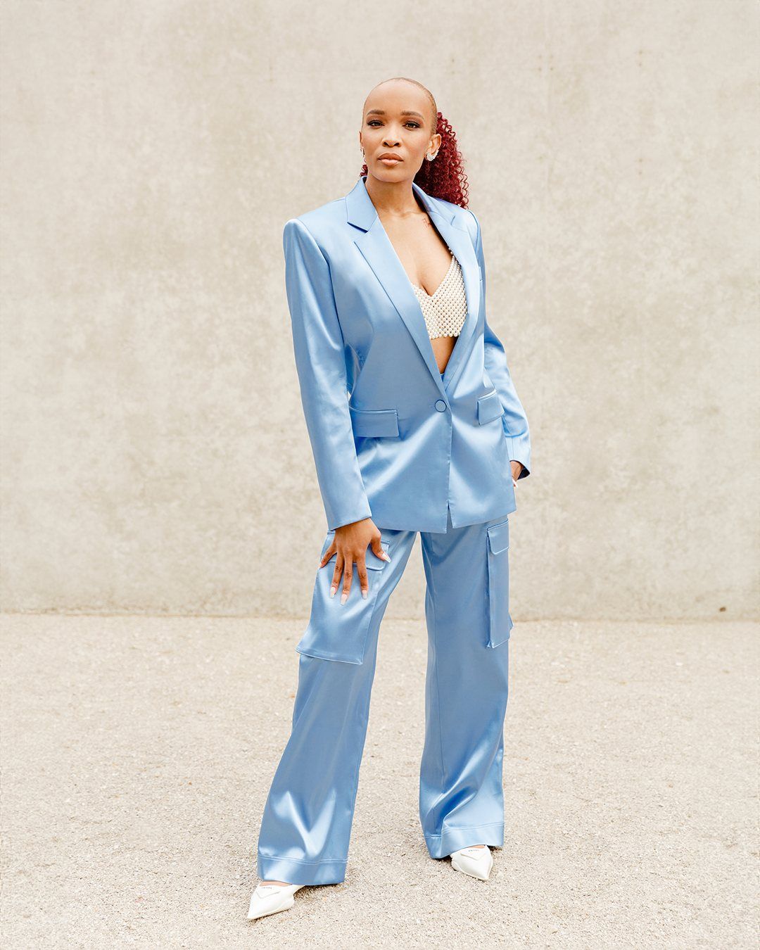 Florie in a satin blue suit