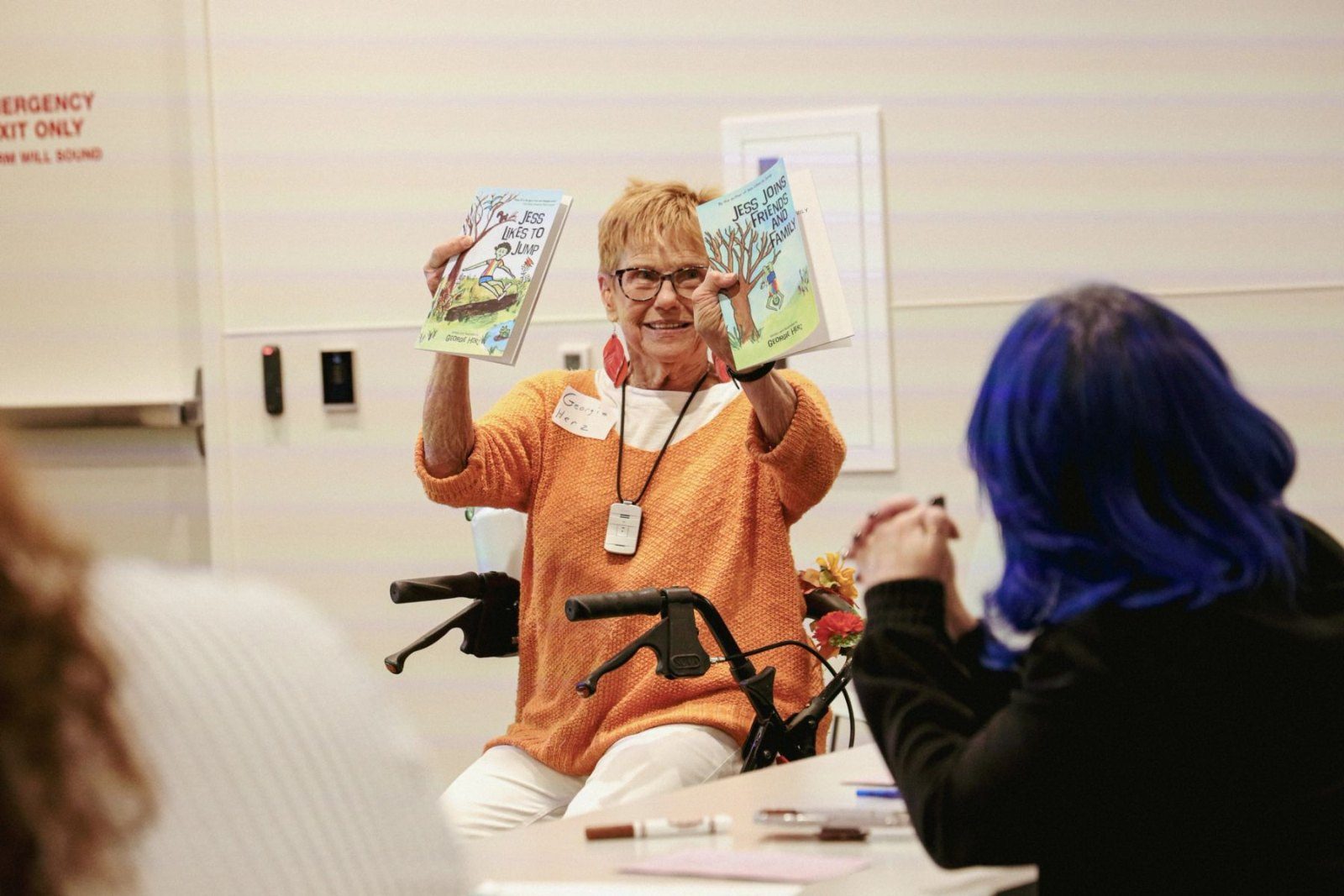 A poet and painter shares her published work with the group.