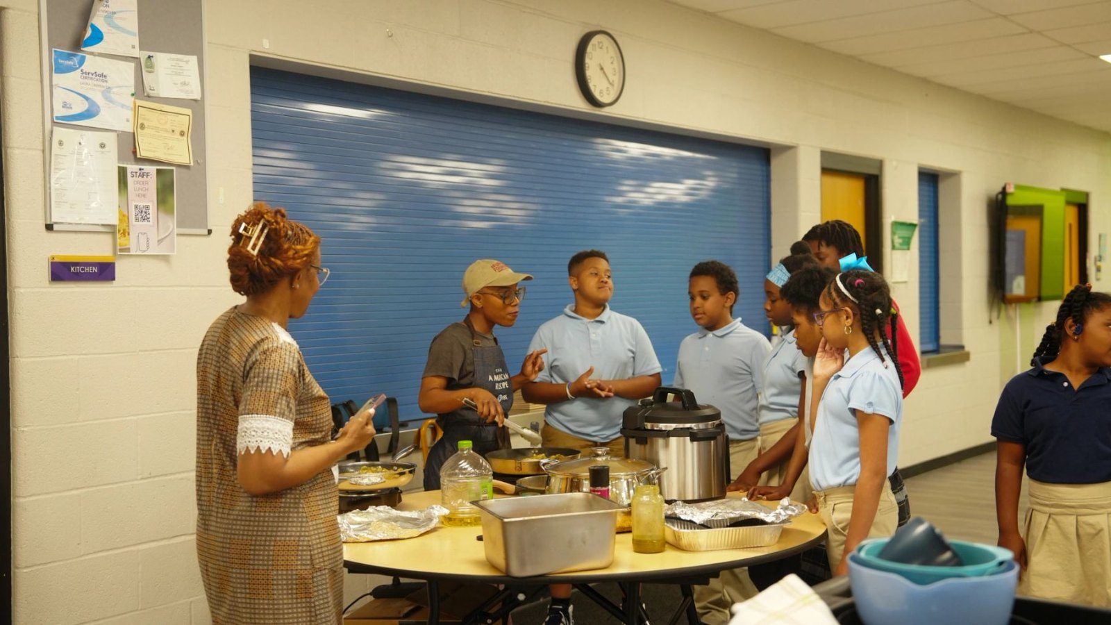 Students gather for an African cooking experience.